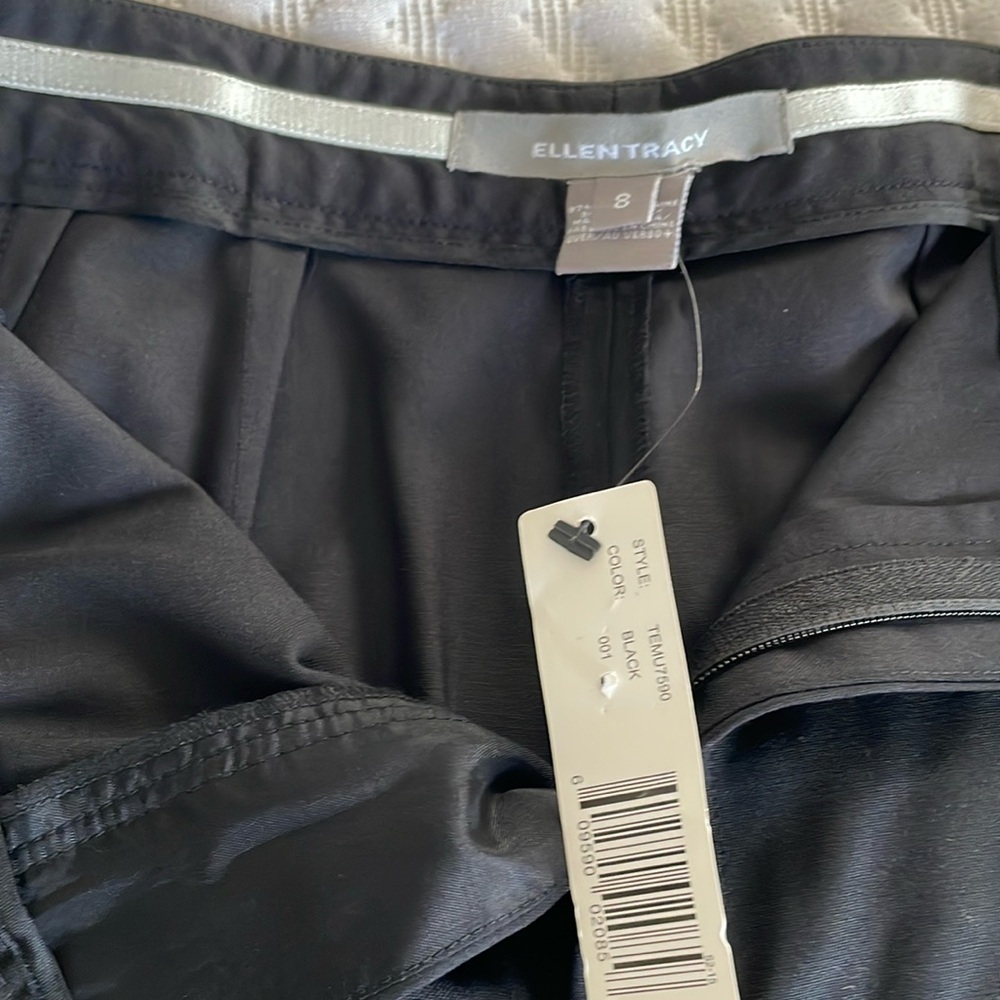 Ellen Tracy pants made of 97% wool 3% spandex.